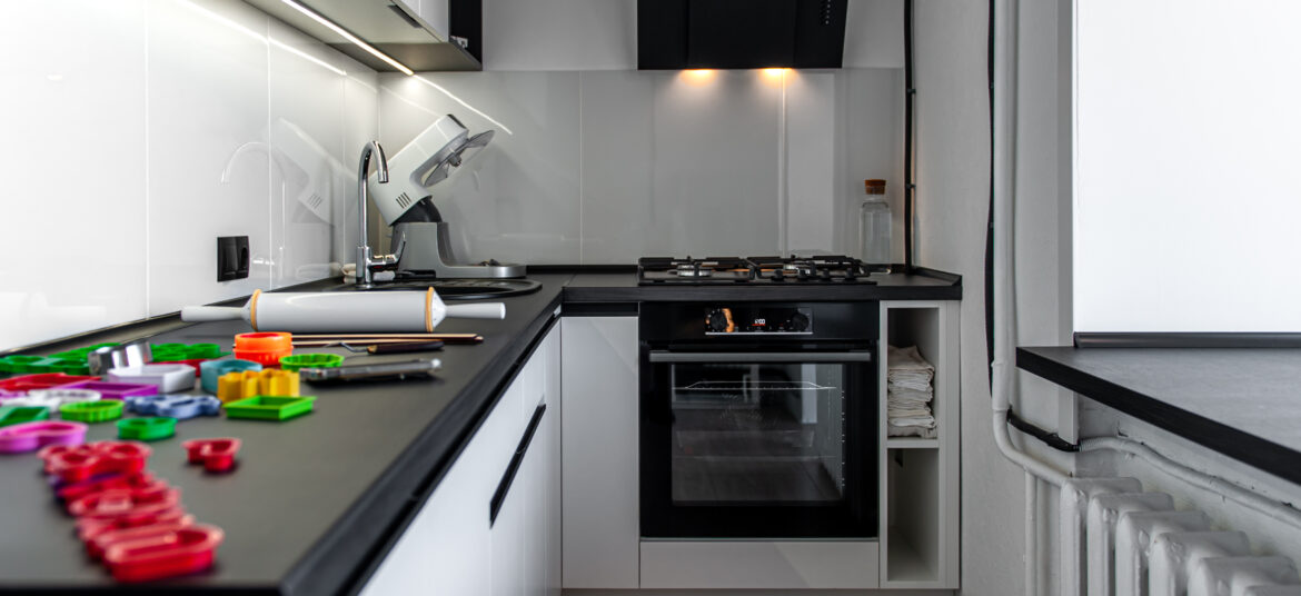 Kitchen interior with cookie cutters, cooking cookies.