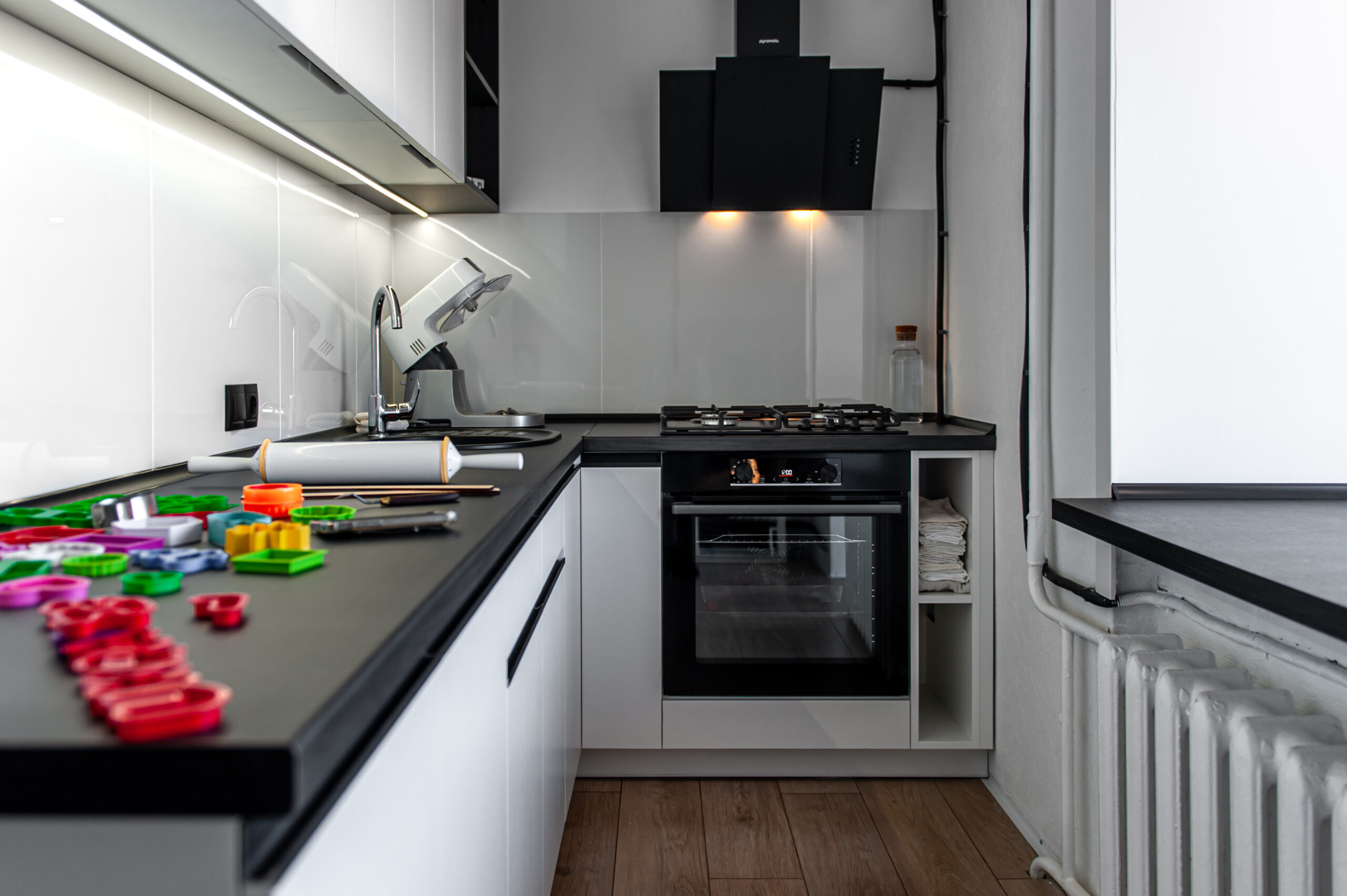 Kitchen interior with cookie cutters, cooking cookies.